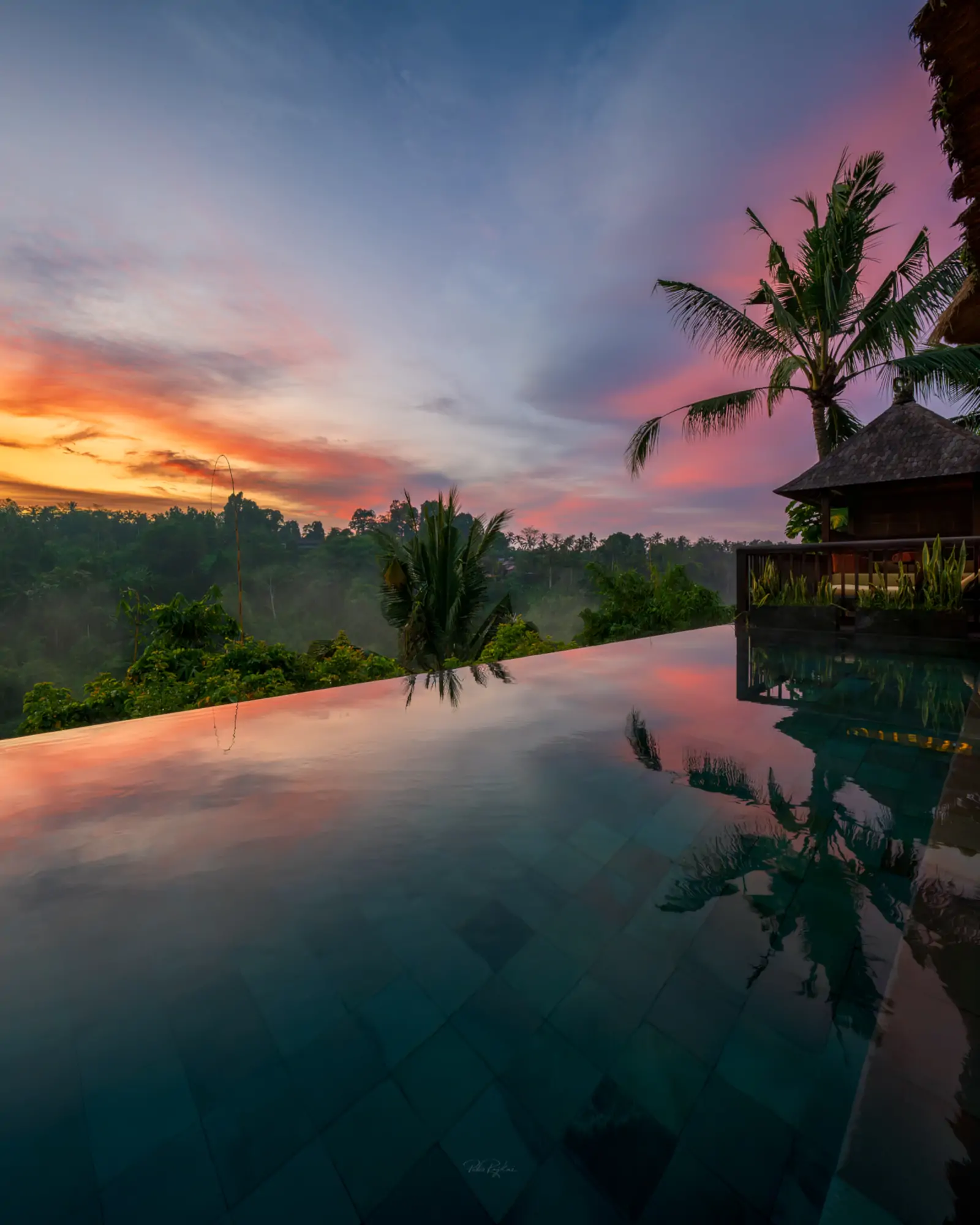 Sunset over Ubud rainforest from Hanging Gardens of Bali in March