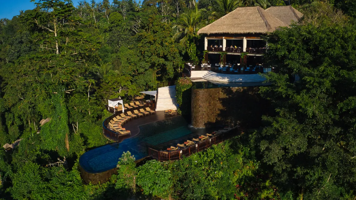 Hanging Gardens of Bali infinity pool overlooking untouched rainforest valley in Ubud