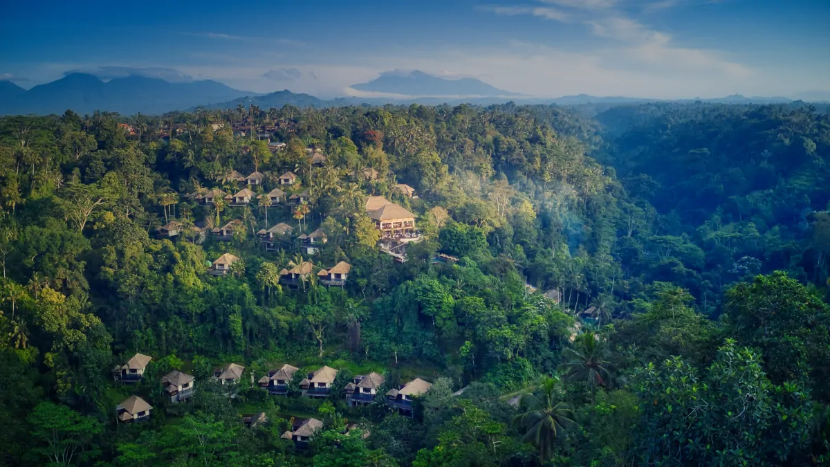 Ubud jungle valley with morning mist and lush greenery showing peaceful Bali atmosphere
