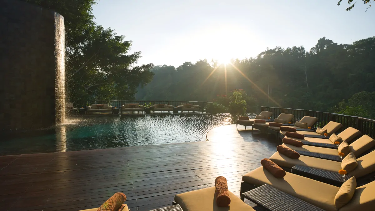 Hanging Gardens of Bali infinity pool overlooking Ubud jungle valley during dry season