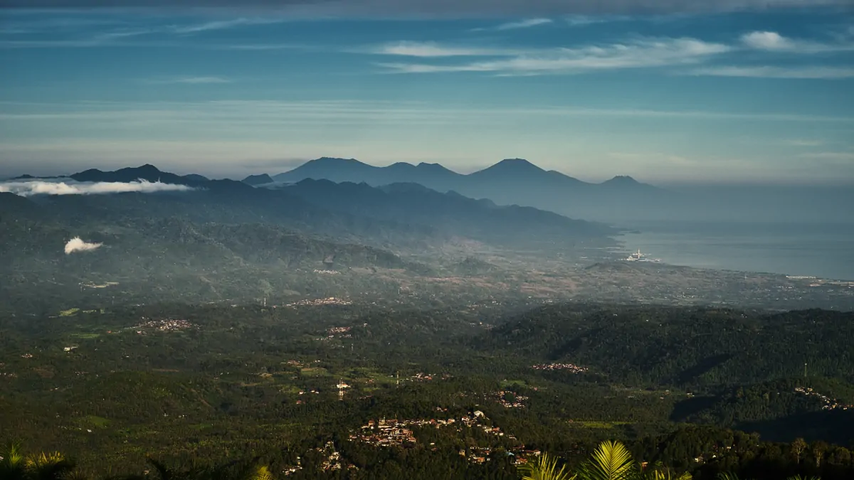 Bali dry season landscape with clear skies and tropical greenery during summer months